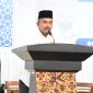 Asisten II Sekdakab Aceh Besar H. M Ali S.Sos MSi, memberi sambutan dalam acara pelepasan jamaah calon haji Kabupaten Aceh Besar di Aula Jeddah Asrama Haji Banda Aceh, Selasa (28/05/2025). 