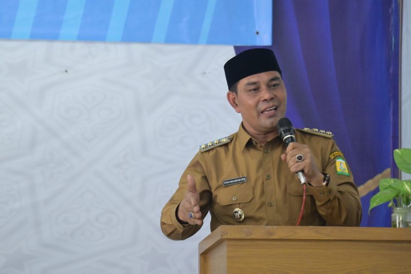 Bupati Aceh Besar, H. Muharram Idris membuka Rakor TPPS Kabupaten Aceh Besar Tahun 2025 di Aula UDKP Kantor Camat Darul Imarah, Aceh Besar, pada Selasa, (15/07/2025).